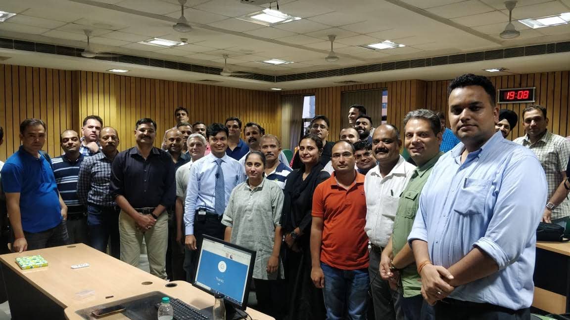 A group of veterans and professionals gathered for a networking session indoors