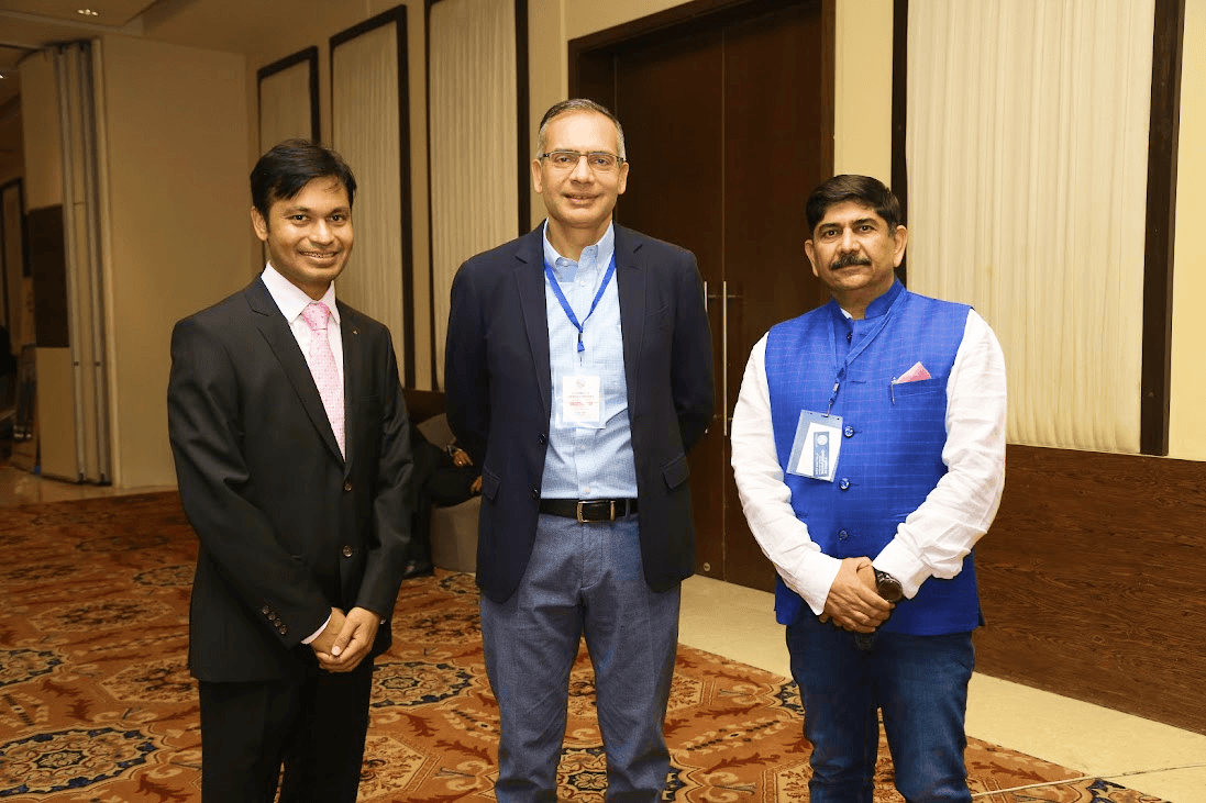 Professionals networking at an unnitee indoor event