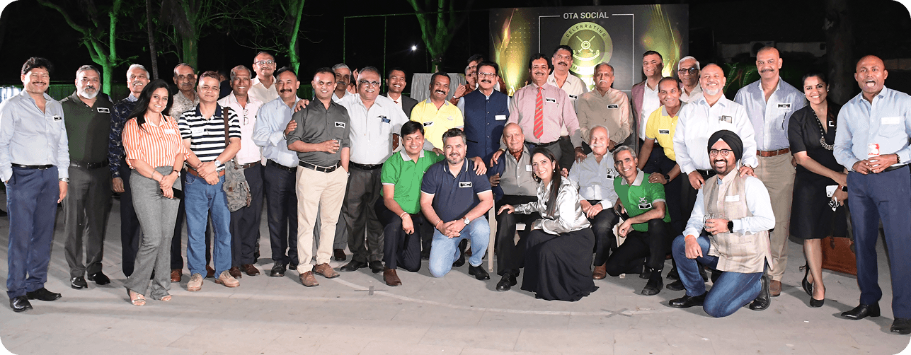 Professionals networking at an outdoor conclave venue