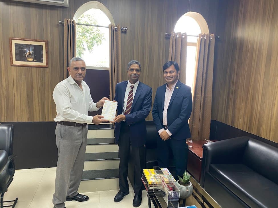 Veterans and business leaders presenting a certificate in an office